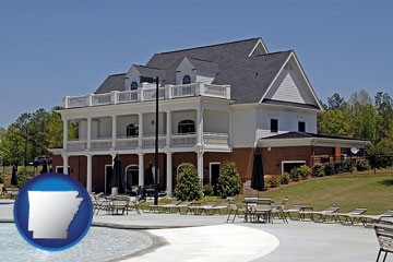 a clubhouse and pool at a country club - with Arkansas icon