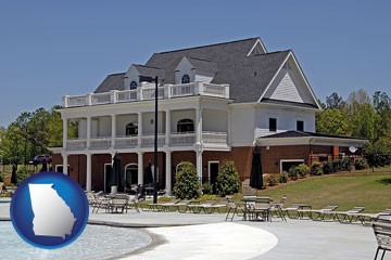 a clubhouse and pool at a country club - with Georgia icon