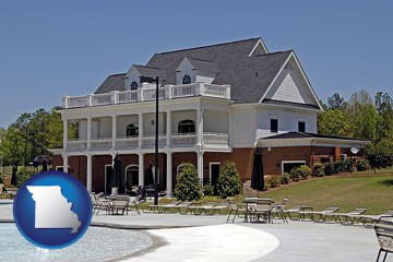 a clubhouse and pool at a country club - with Missouri icon